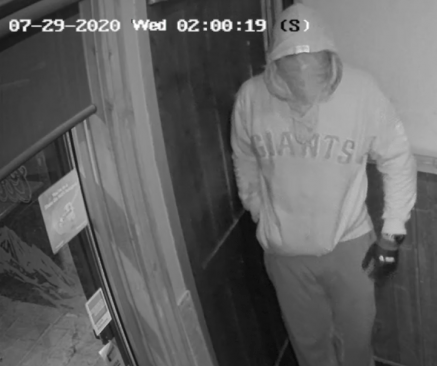 Police are looking for the suspect involved in an armed robbery of a pub in northeast Calgary on July 29.