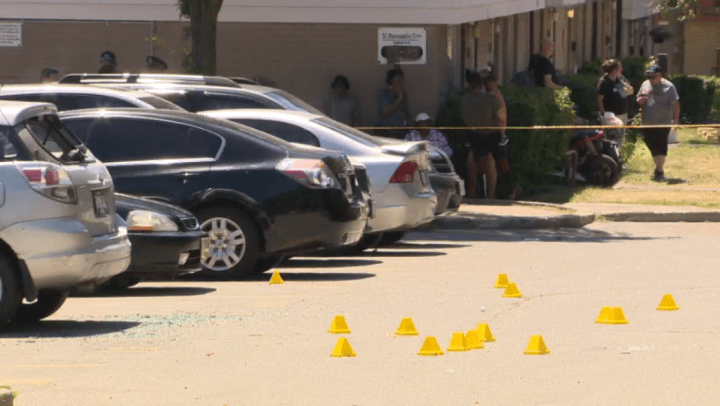 Evidence markers at the scene of a fatal shooting in an apartment complex in Toronto's east-end on Saturday.