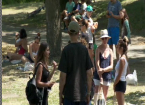 People lining up to access Laurier park's public pool as a heat wave sets in Montreal. Tuesday July 7, 2020.
