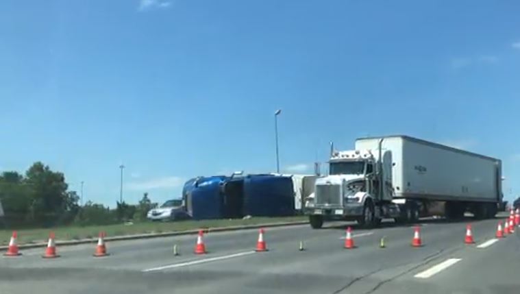 A semi-truck flipped over at East Arcola Avenue and Ring Road, say police. 