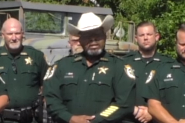 Clay County Sheriff Darryl Daniels, centre, issues a warning to protesters in this image from video on June 30, 2020.
