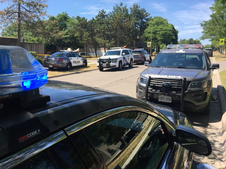 Police at the scene of a shooting in Toronto’s east end on Saturday.