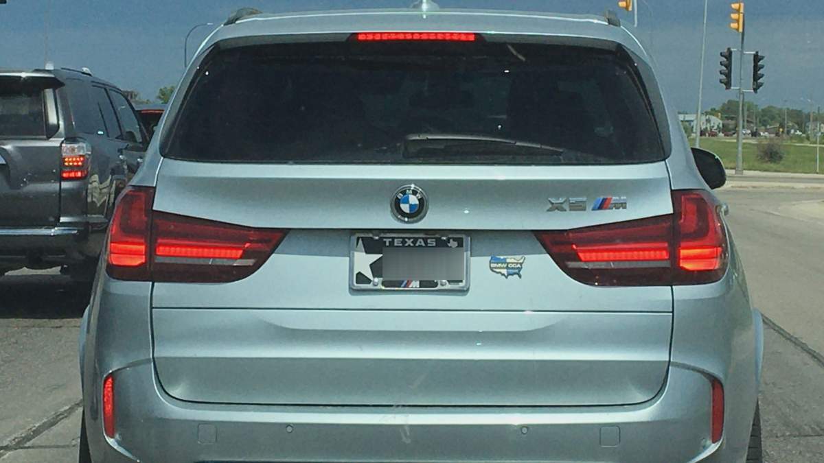 A vehicle with plates from Texas driving in Winnipeg. 