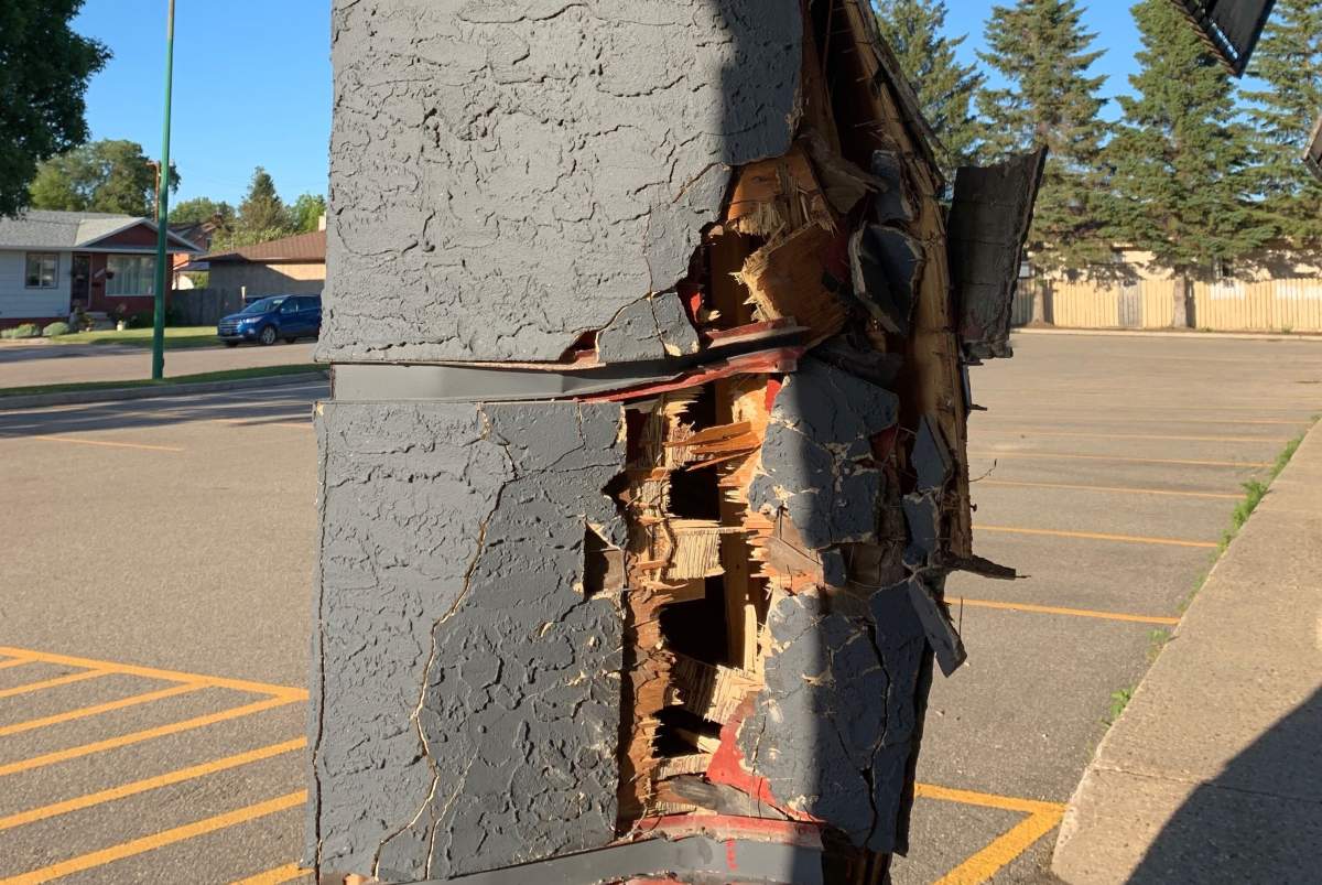 One of the support beams on the building’s parapet was destroyed.