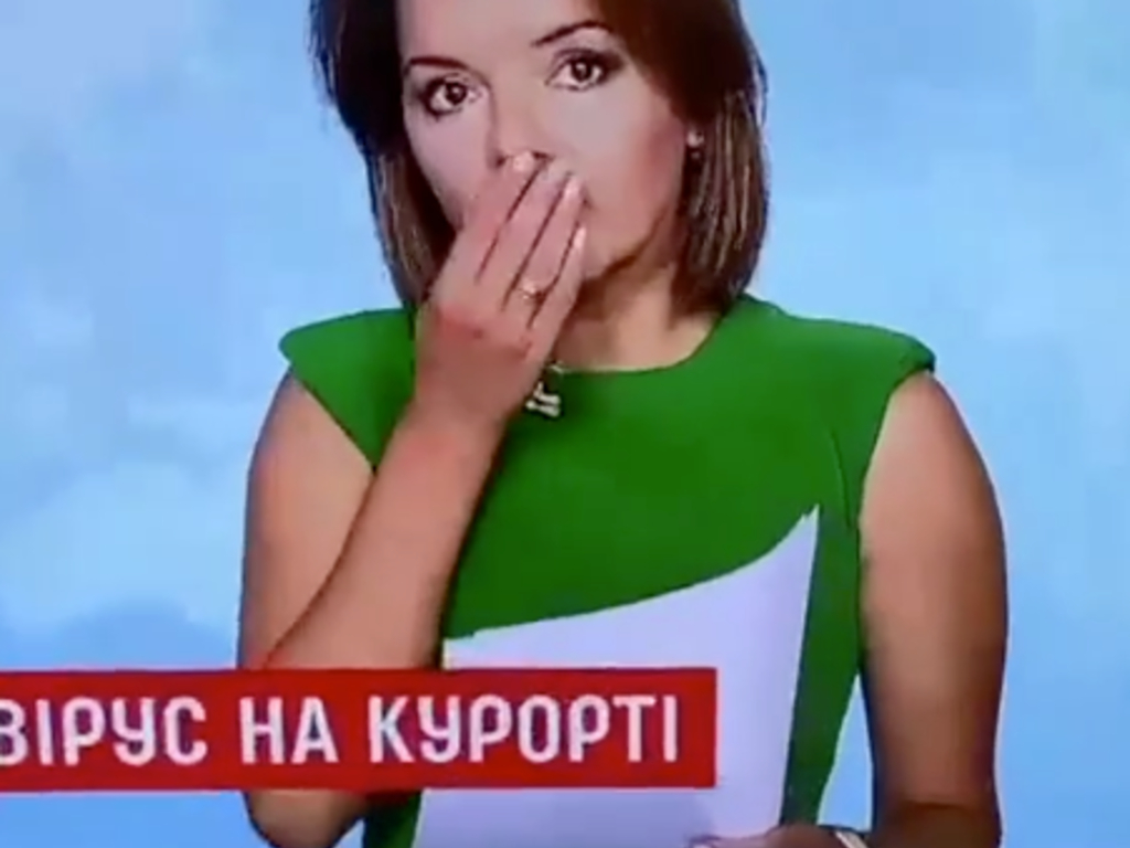 A Ukranian news anchor's tooth fell out mid-broadcast, but she kept going like nothing happened.