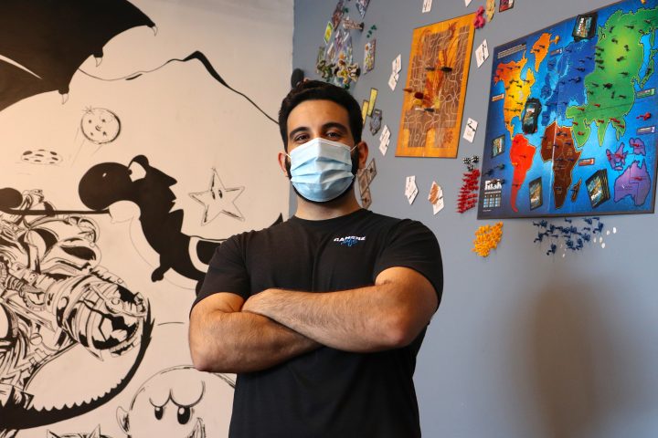 Nik Bakhshalian, co-owner of Gamerz café, stands at his favourite section of the shop on Wednesday, Aug. 19, 2020.  