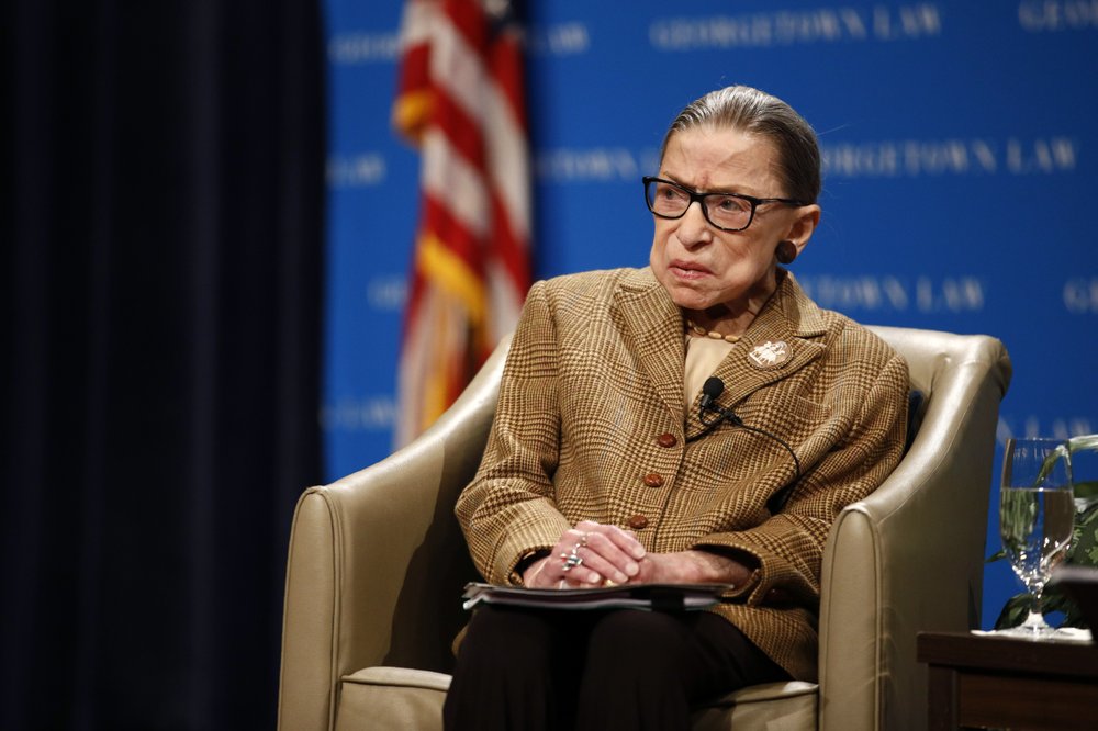 In this Feb. 10, 2020, file photo U.S. Supreme Court Associate Justice Ruth Bader Ginsburg speaks during a discussion on the 100th anniversary of the ratification of the 19th Amendment at Georgetown University Law Center in Washington.