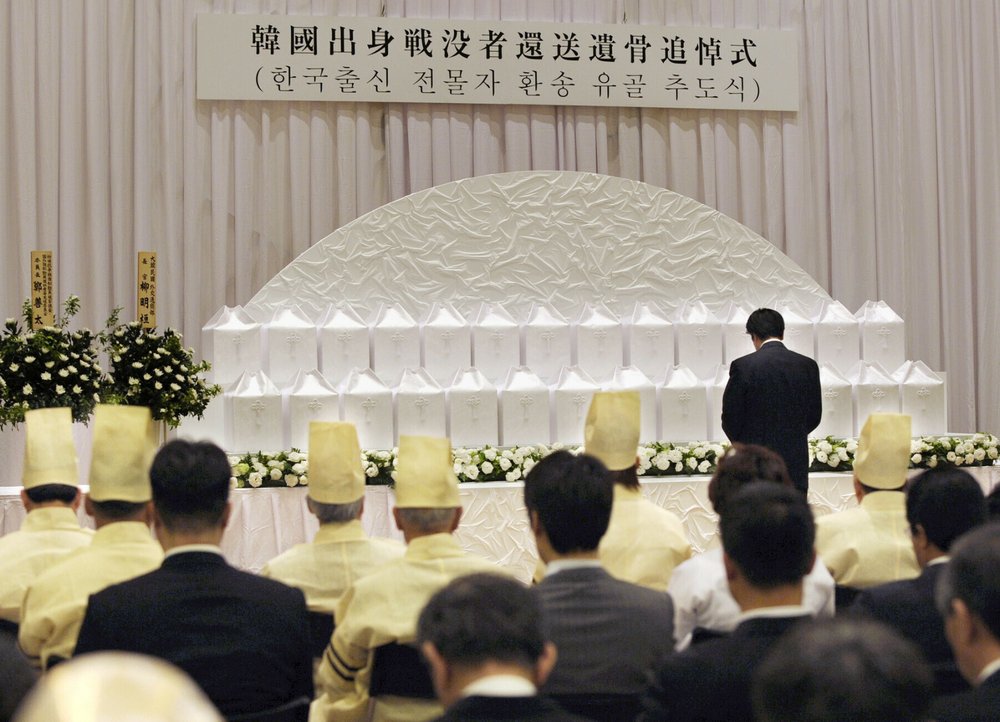 A ceremony to commemorate the returning to South Korea the remains of Korean solders who died while serving in the Japanese Army during World War II, is held at Buddhist temple, Yutenji, in Tokyo on May 18, 2010. About 700 remains of the Korean war-dead have been separately stored at the temple. Health and welfare ministry officials say they are the only remains of the former Korean soldiers that they are aware of. More than half of the 700 are from North Korea. Several hundred remains had been previously returned to their homes through diplomatic arrangement, but talks have been stalled in recent years as diplomatic relations have soured over Japan’s wartime actions.