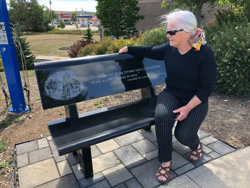 Nancy Watters sits at a memorial bench honouring her daughter, Ellen Watters, in Apohaqui, N.B.,