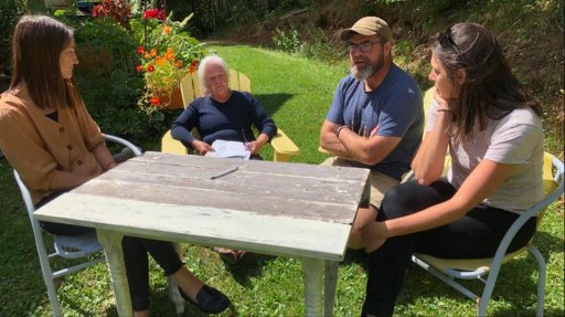 Friends of Ellen Watters sit with her mother, Nancy Watters (second from left).