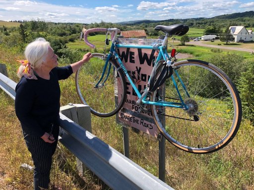 Nancy Watters at a memorial marking the location where Ellen Watters was struck and killed while riding her bicycle.