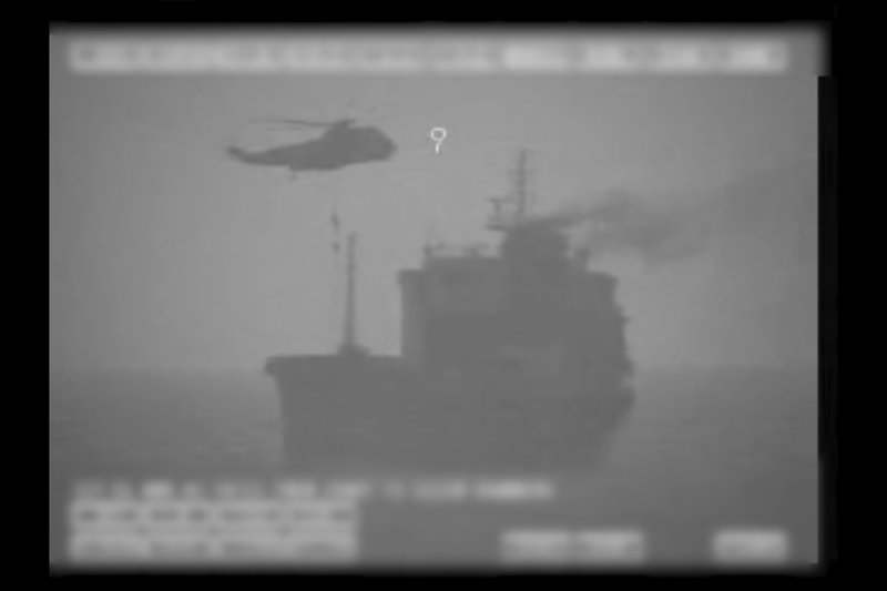 In this image made from video released by the U.S. military's Central Command, Iranian commandos fast-rope down from a helicopter onto the MV Wila oil tanker in the Gulf of Oman off the coast of the United Arab Emirates on Wednesday, Aug. 12, 2020. 