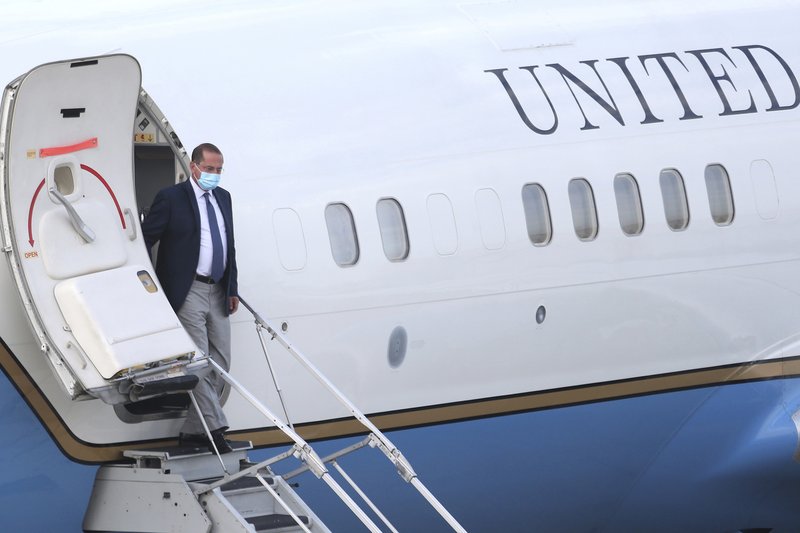 U.S. Health and Human Services Secretary Alex Azar arrives at Taipei Songshan Airport in Taipei, Taiwan, Sunday, Aug. 9, 2020. Azar arrived in Taiwan on Sunday in the highest-level visit by an American Cabinet official since the break in formal diplomatic relations between Washington and Taipei in 1979. 