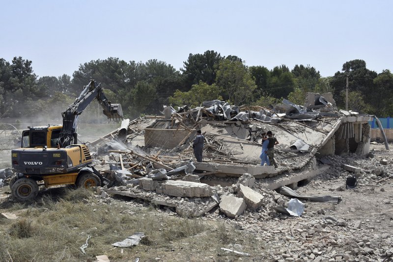 Afghan Security personnel work at the site of a suicide truck bombing in northern Balkh province of Afghanistan, Tuesday, Aug. 25, 2020. Afghan officials said the latest attacks across the country have left at least 12 people dead and scores wounded, including the Taliban truck bombing in the country’s north that targeted a commando base. The violence comes as expectations had been rising that negotiations could soon get underway between the Afghan government and the insurgents. (AP Photo)
.