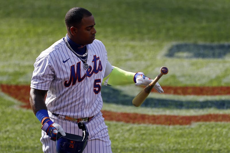 New York Mets' Yoenis Cespedes reacts after striking out against the Atlanta Braves during the sixth inning of a baseball game Saturday, July 25, 2020, in New York. 
