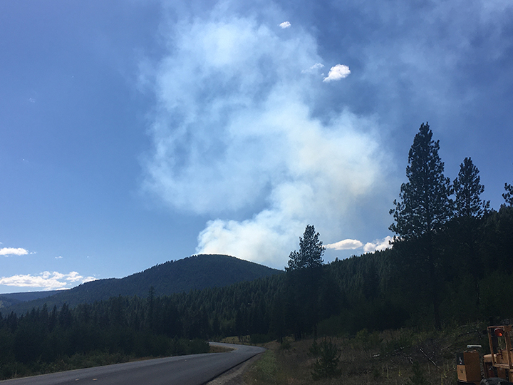 Smoke rises from a wildfire burning near Beaverdell on Tuesday.