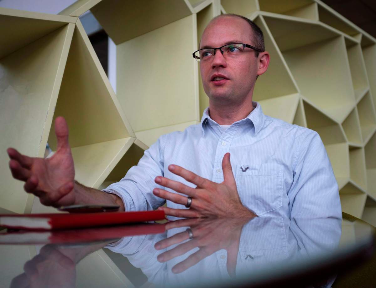 Economist Trevor Tombe speaks during an interview at the Taylor Family Digital Library at the University of Calgary in Calgary, Alta., Thursday, Nov. 23, 2017.