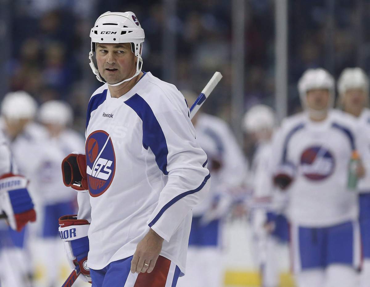 Former Winnipeg Jet Dale Hawerchuk leads his team as captain during a practice for the NHL Heritage Classic Alumni game in Winnipeg on Friday, October 21, 2016. Hockey Hall of Famer Dale Hawerchuk is fighting stomach cancer.