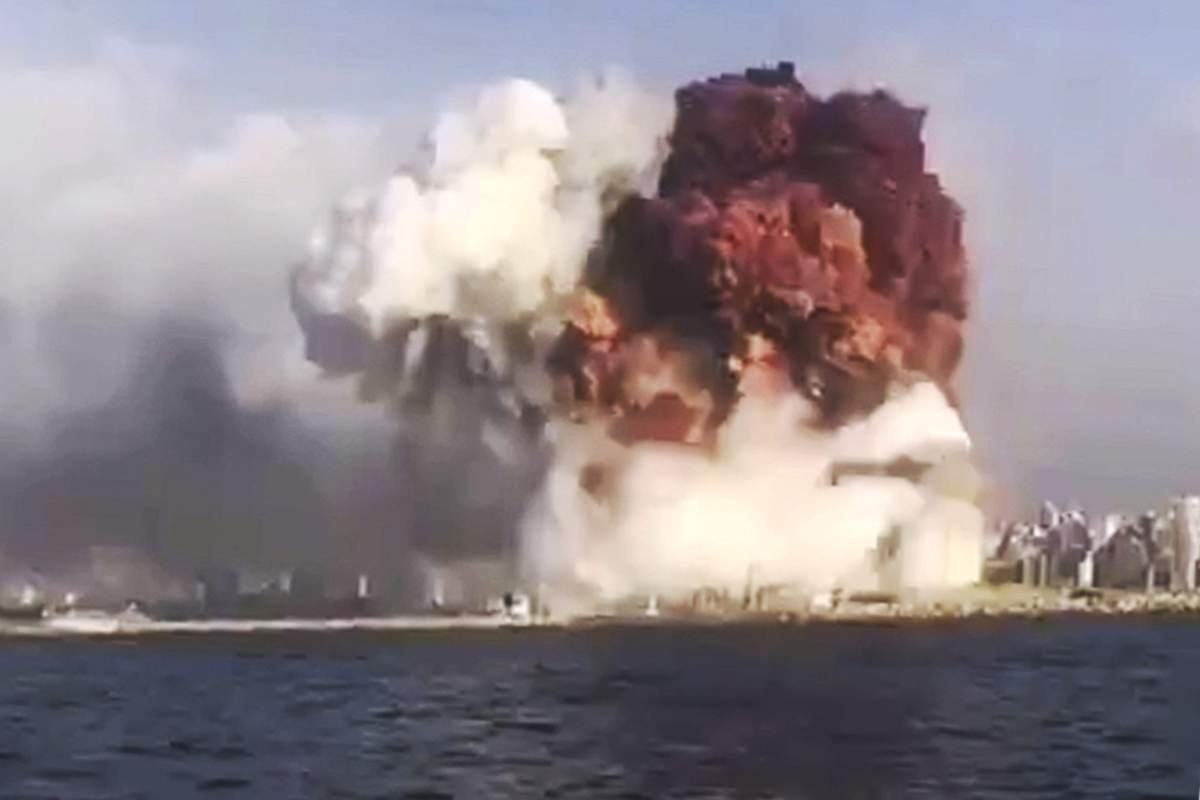 A still image grabbed from a mobile phone video and made available by Twitter user @tayyaraoun1 showing the moment of the massive explosion that rocked the harbour area of Beirut, Lebanon, Aug. 4, 2020.