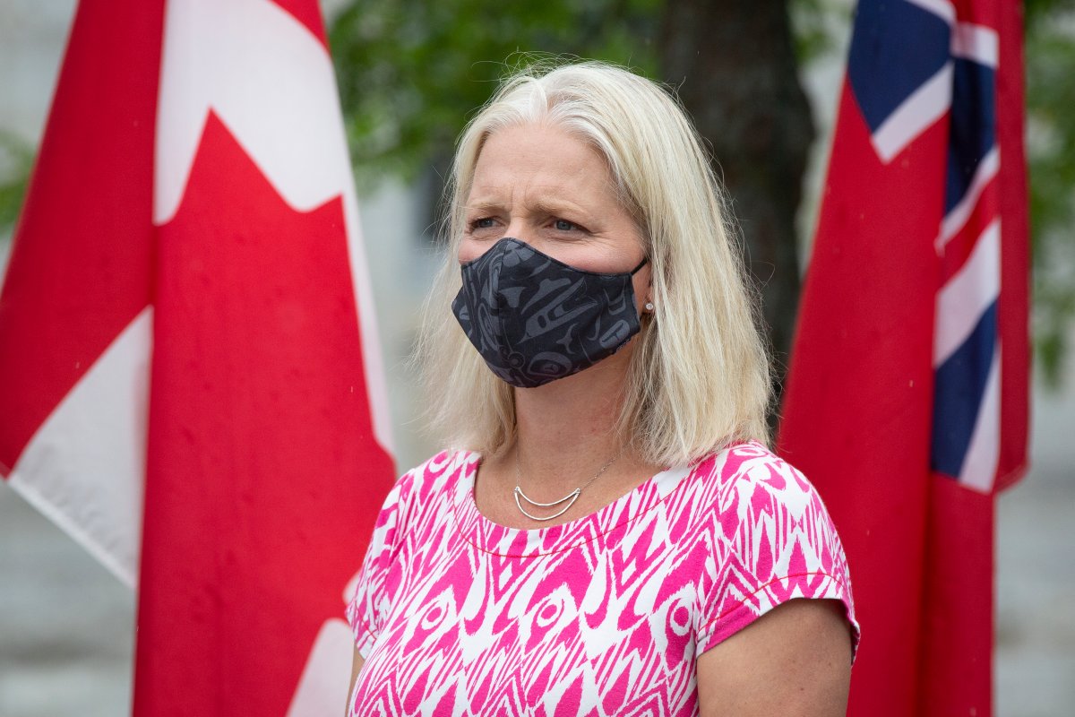 Minister of Infrastructure and Communities Catherine McKenna wears a mask during an infrastructure announcement in Kingston, Ontario on Monday, Aug 10, 2020.