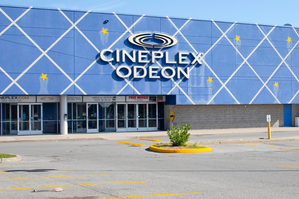Cineplex Inc. reported a loss of $98.9 million in its latest quarter as its movie theatres were closed due to the COVID-19 pandemic. A closed Cineplex Odeon is shown in Whitby, Ont., Friday, July 24, 2020.