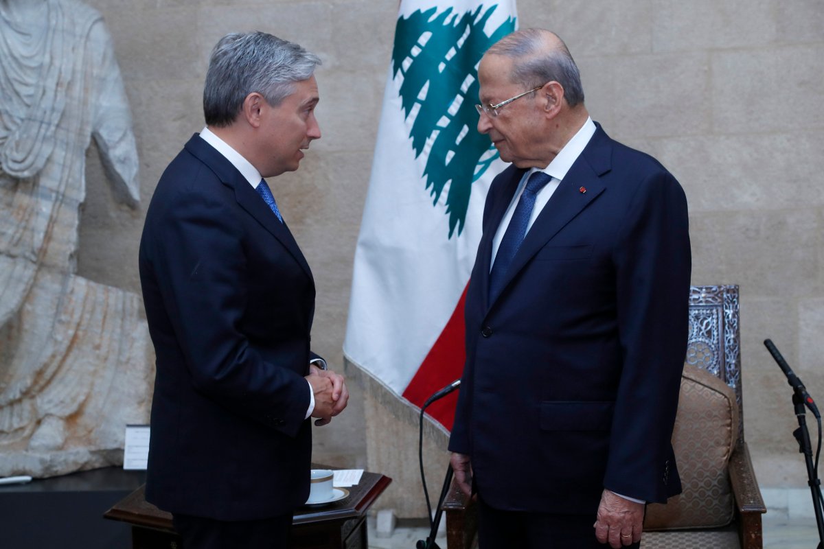 In this photo released by Lebanon's official government photographer Dalati Nohra, Lebanese President Michel Aoun, right, meets with Canadian Foreign Minister Francois-Philippe Champagne, at the presidential palace, in Baabda, east of Beirut, Lebanon, Thursday, Aug. 27, 2020. 