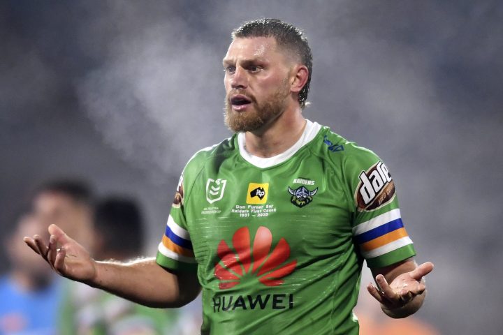 Elliott Whitehead of the Canberra Raiders National Rugby League team raises his arms after his try was disallowed during a match against the Melbourne Storm in Canberra, Australia, July 11, 2020. Chinese telecom giant Huawei announced on Monday, Aug. 31, 2020, it is ending its oldest major sporting sponsorship deal in the world when it ends its contract with the Canberra Raiders after nine years, blaming a "continued negative business environment.".