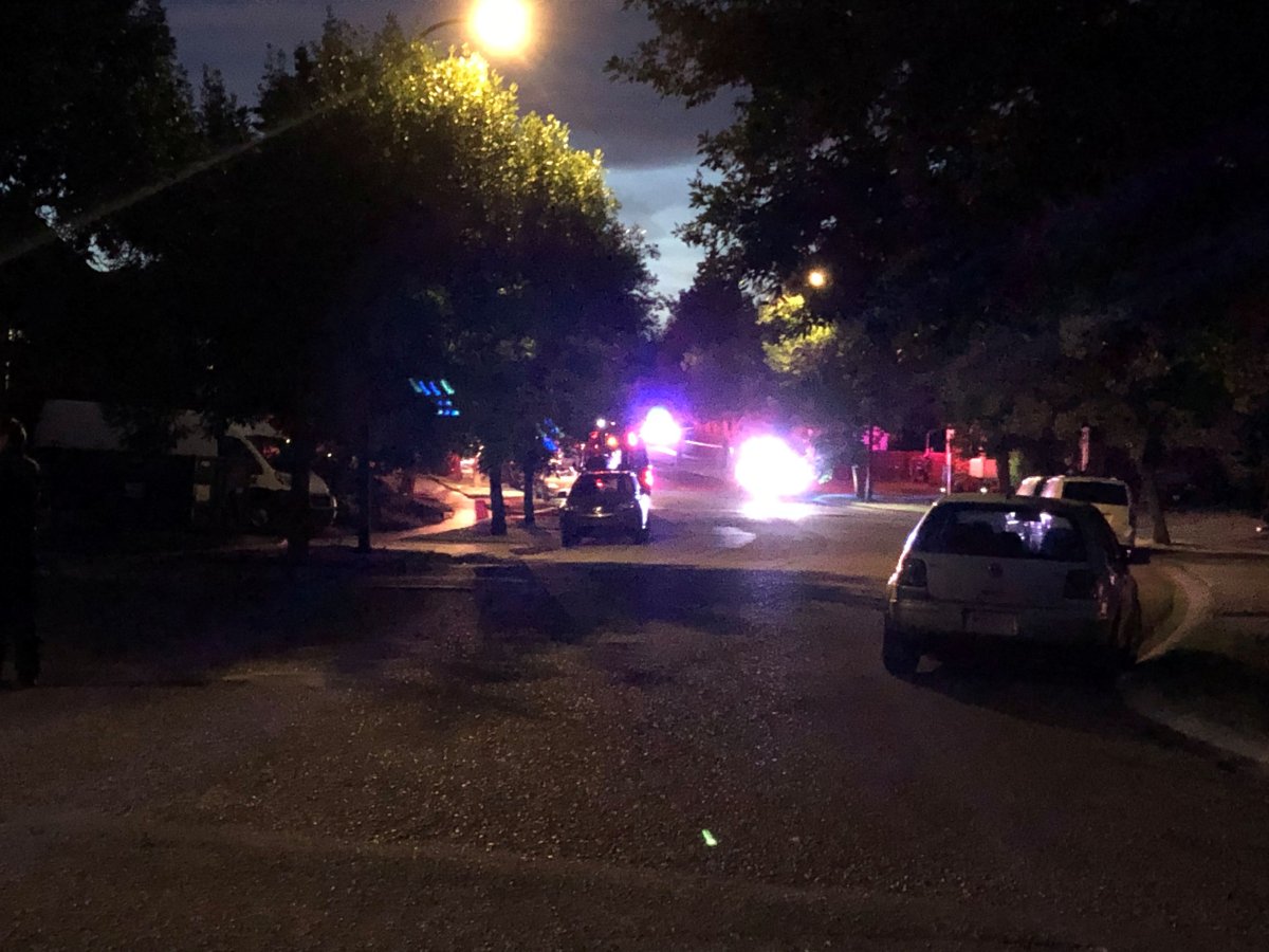 Calgary police on scene after two people were reportedly killed in a firearms incident, Friday, Aug. 28, 2020. 