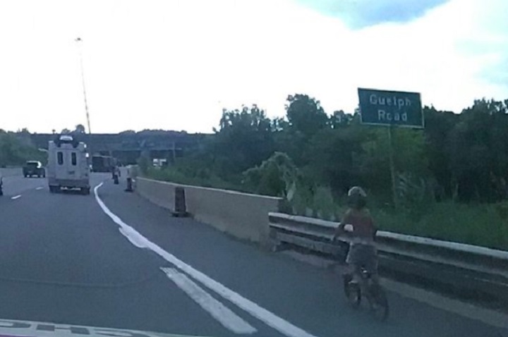 OPP say a child was found bicycling Highway 403 in Hamilton.