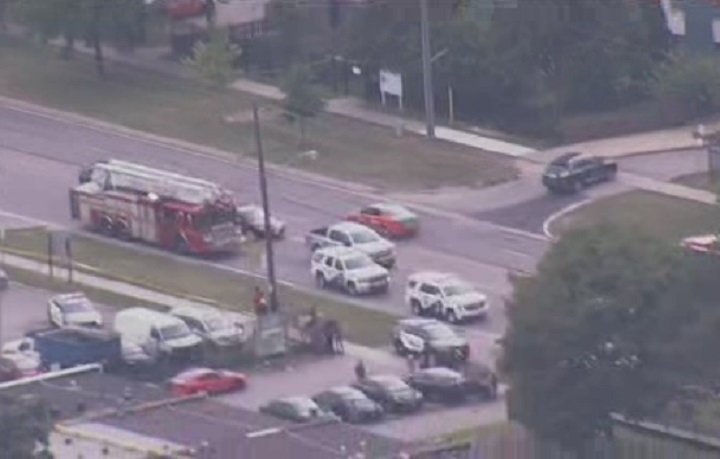 Officers block off a plaza on Jane Street north of Yorkwoods Gate Friday afternoon.