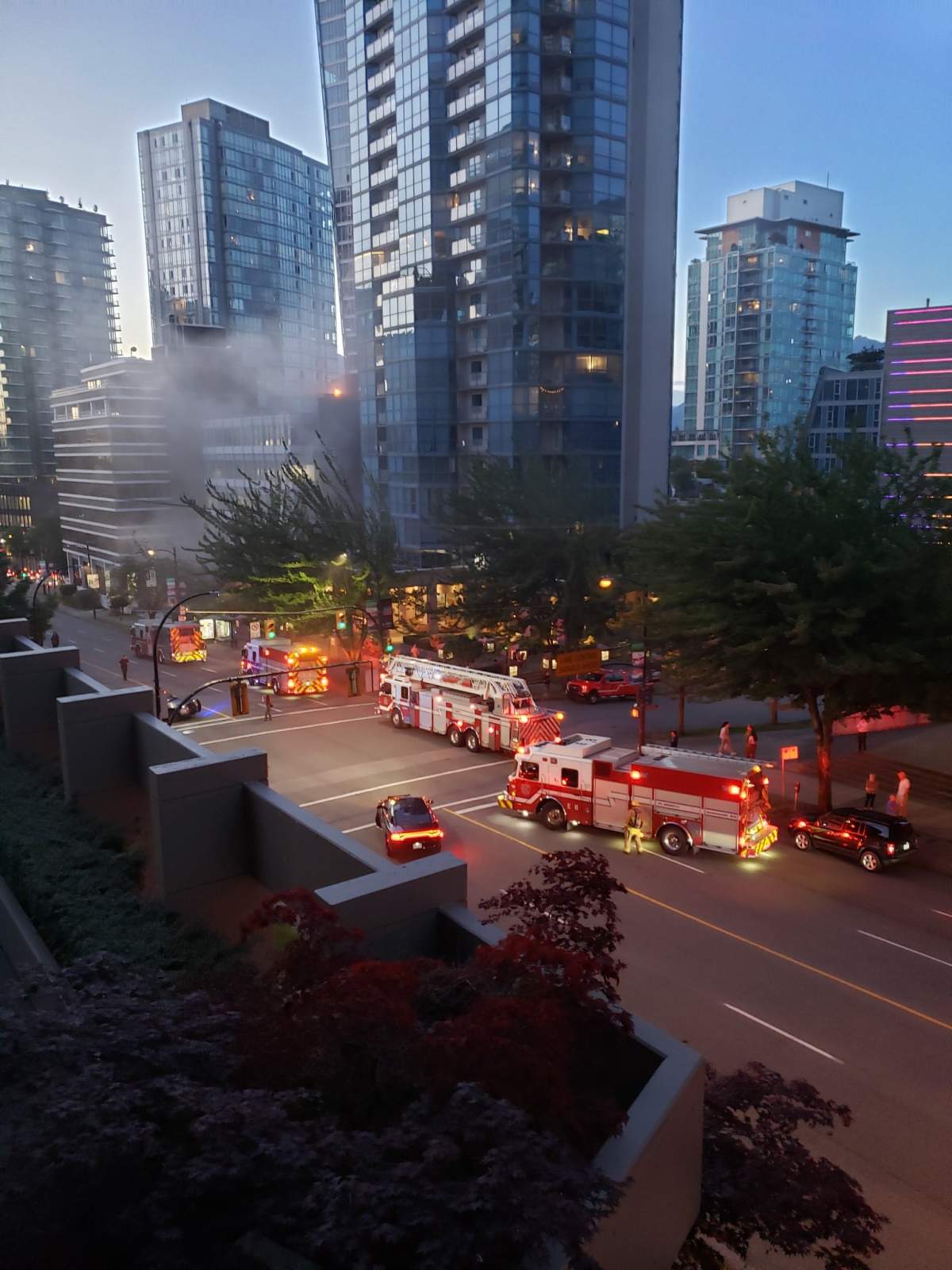 Vancouver fire crews had to make their way carefully through thick smoke to determine the source somewhere in the lower level of a seven storey commercial building in Coal Harbour Sunday evening.