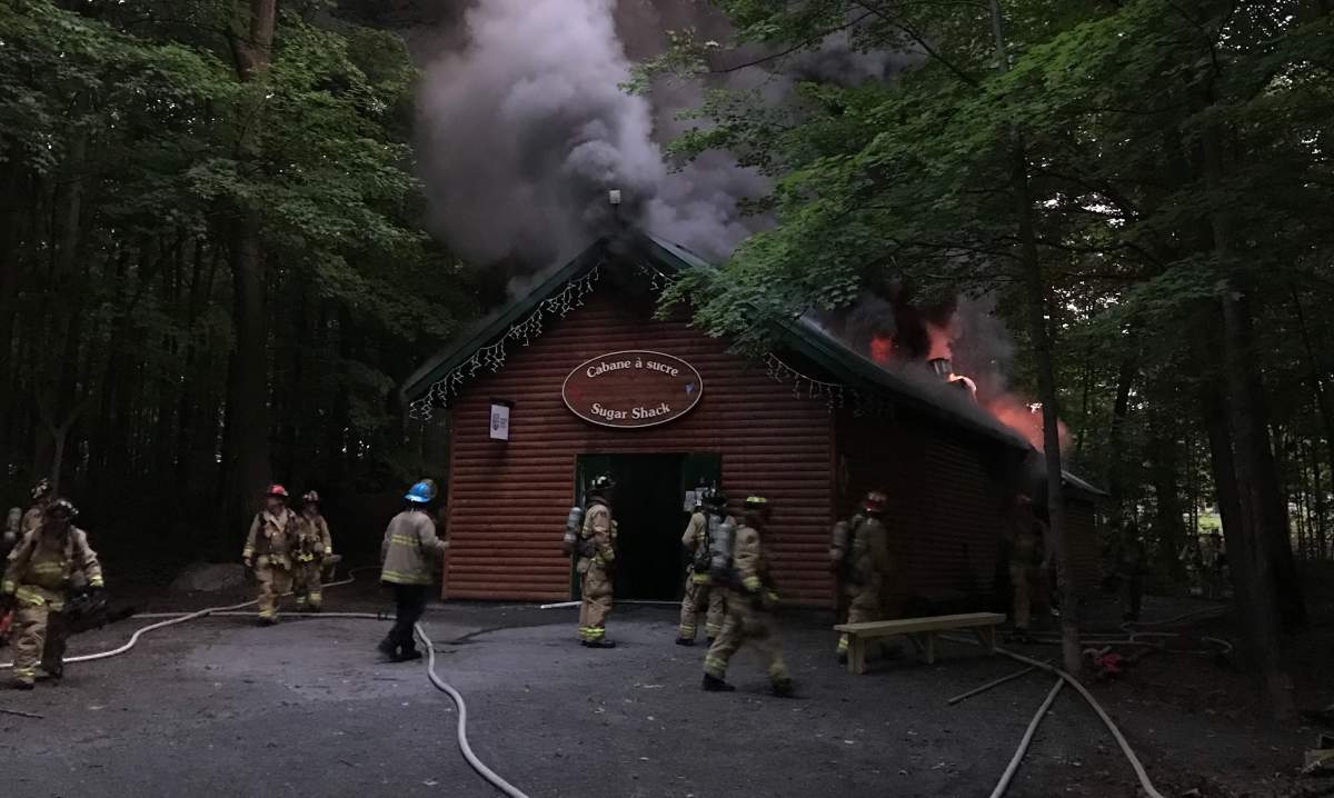 Ottawa Fire Services on-site at the Vanier Sugar Shack, where a 911 caller reported smoke and flames from the east-end building Thursday morning.