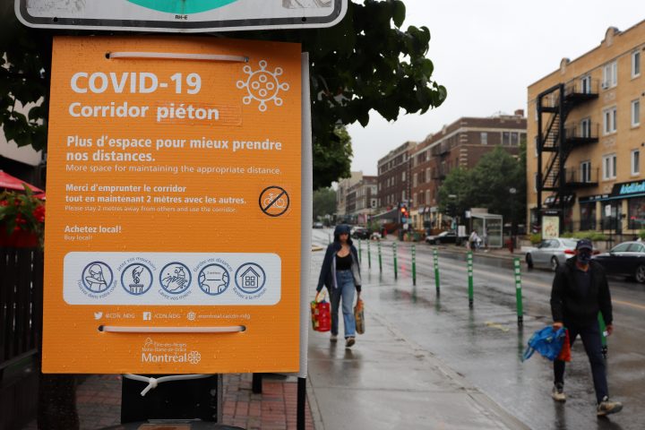 Orange signs as such  are hug along Monkland Avenue describing the street's pedestrian walkway on Tuesday, Aug. 4, 2020.