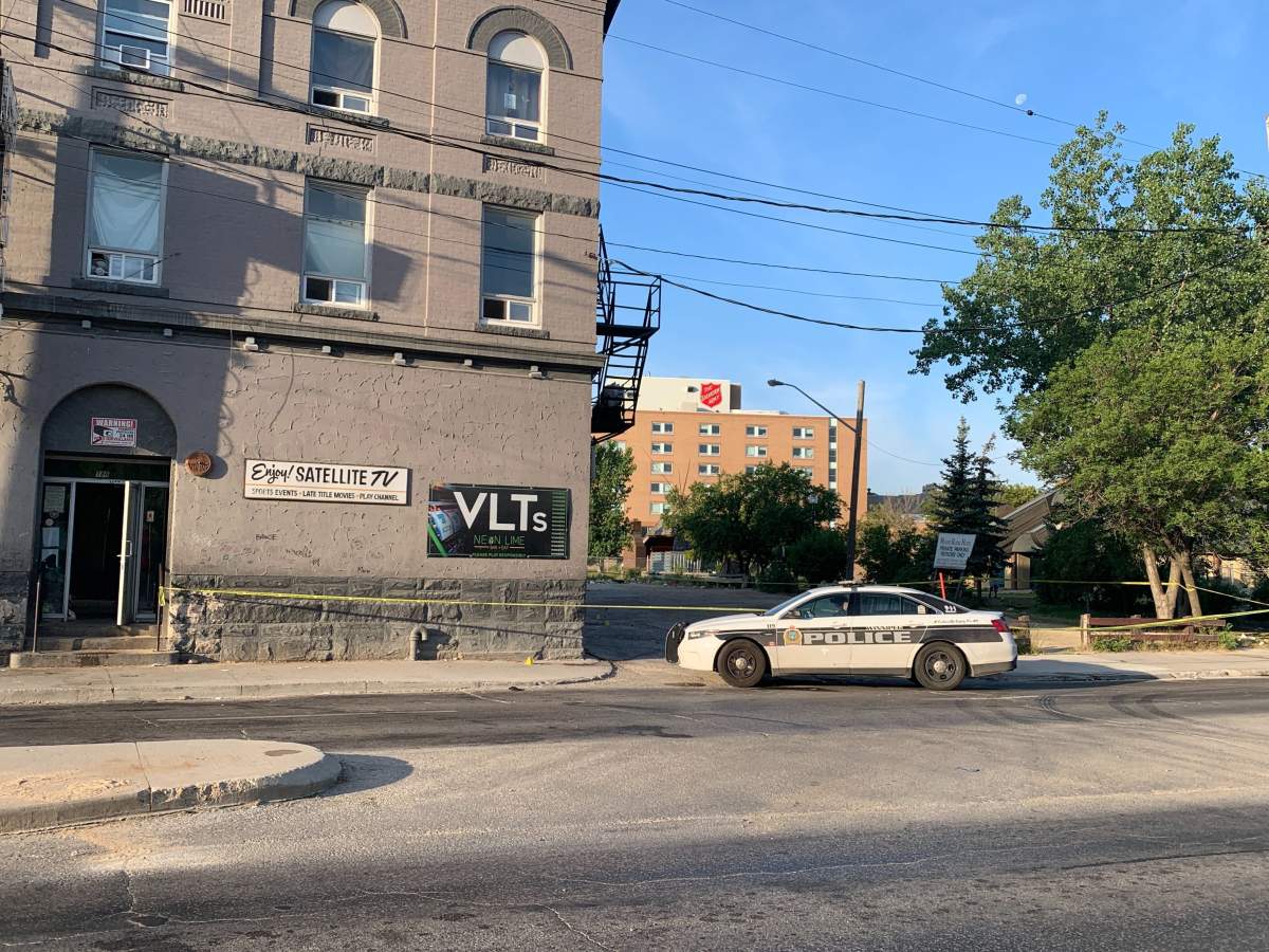 Winnipeg police outside the Mount Royal Hotel on Aug. 6.