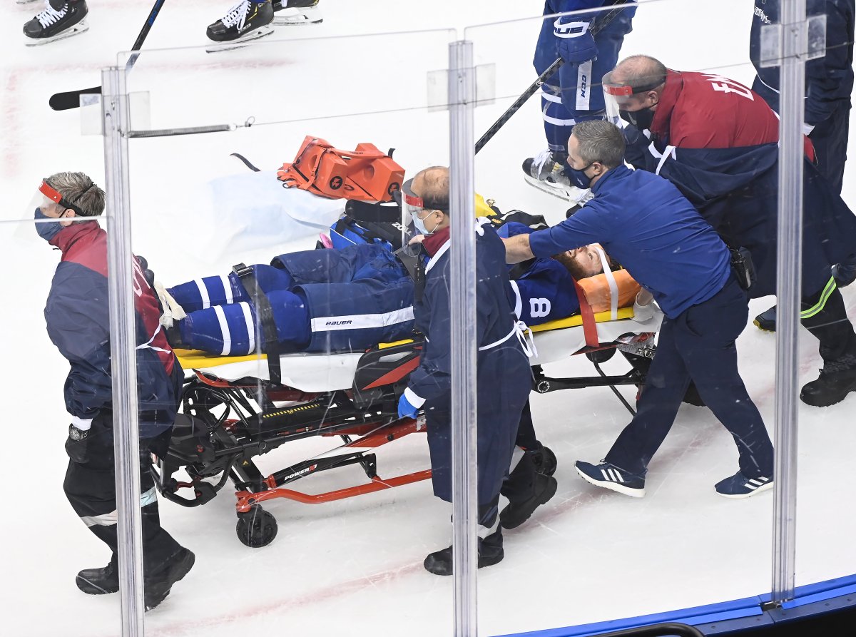 Toronto Maple Leafs defenceman Jake Muzzin (8) leaves the ice on a stretcher while playing against the Columbus Blue Jackets during third period NHL Eastern Conference Stanley Cup playoff action in Toronto on Tuesday, August 4, 2020.