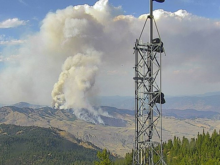 A view of the Palmer wildfire near Oroville, Wash., from the Aeneas lookout.