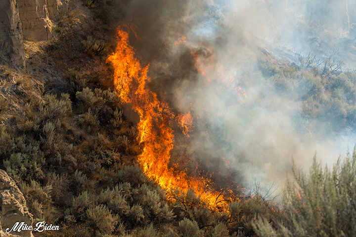 Another view of the fire near Highway 97.