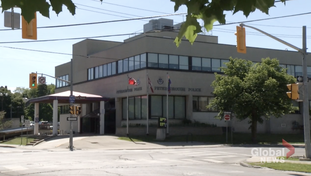 Peterborough police arrested a man who allegedly called 911 to claim there was a bomb at the police station on Water Street.