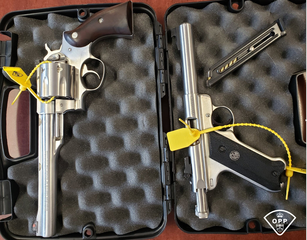 Two handguns, reported stolen in 2017, were recovered when OPP officers responded to a domestic dispute call on Aug. 27, 2020.