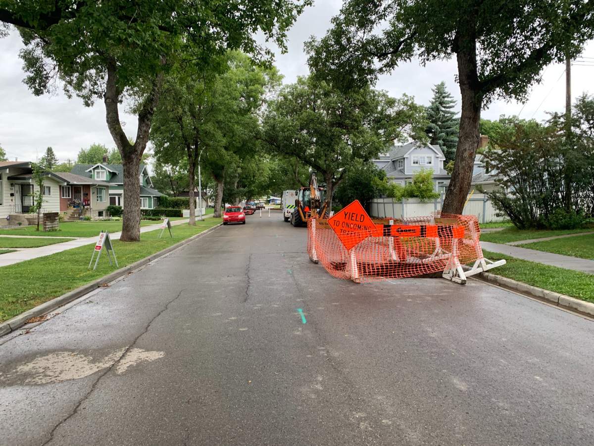 Epcor is working to repair a sink hole at 90 Avenue and 89 Street, Aug. 22, 2020.