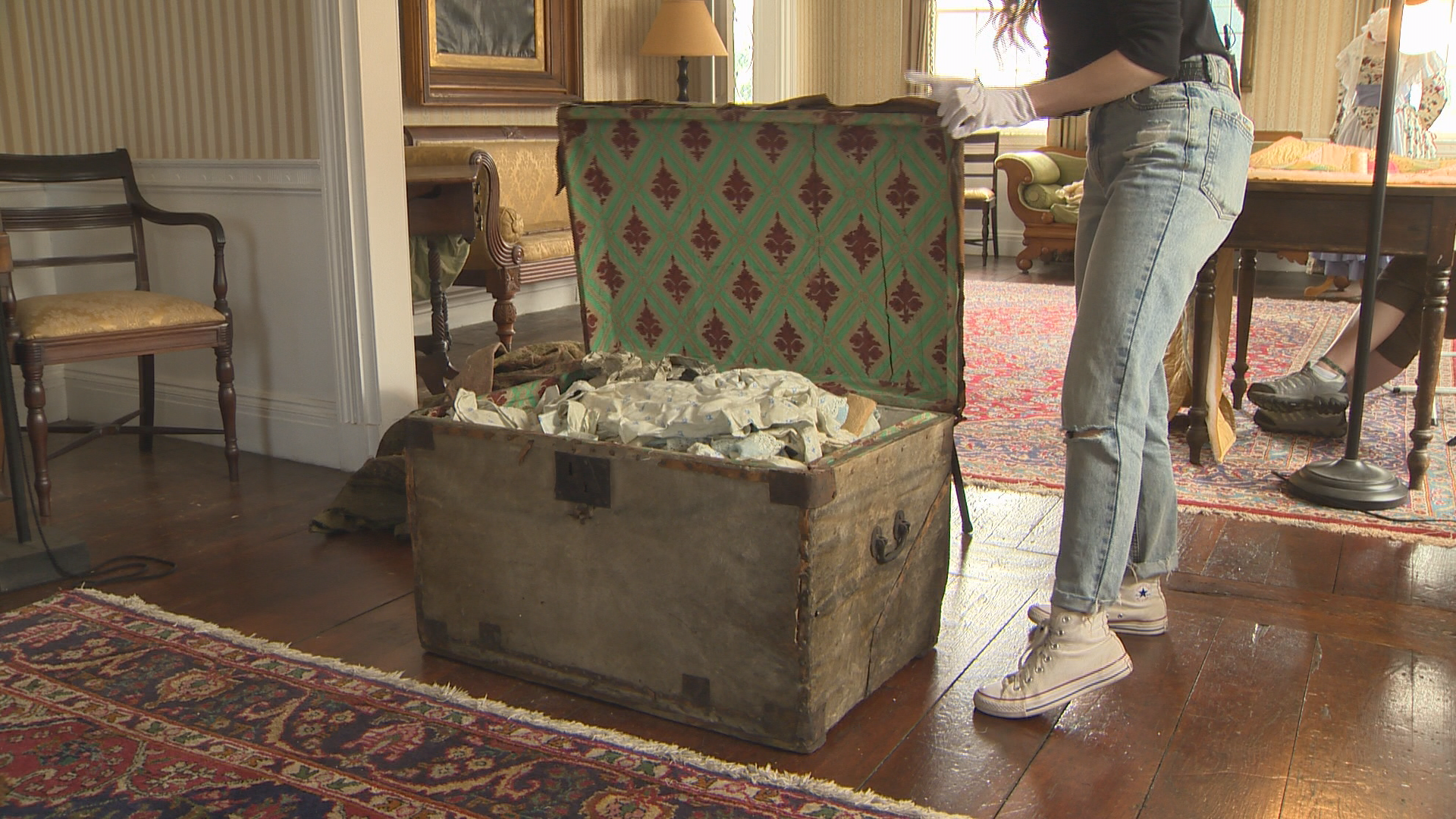 Three trunks of antique textiles were found in the Loyalist House this summer.