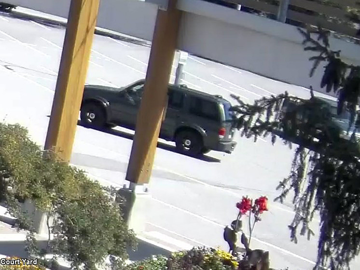 A security camera view of the suspect’s Ford Explorer.
