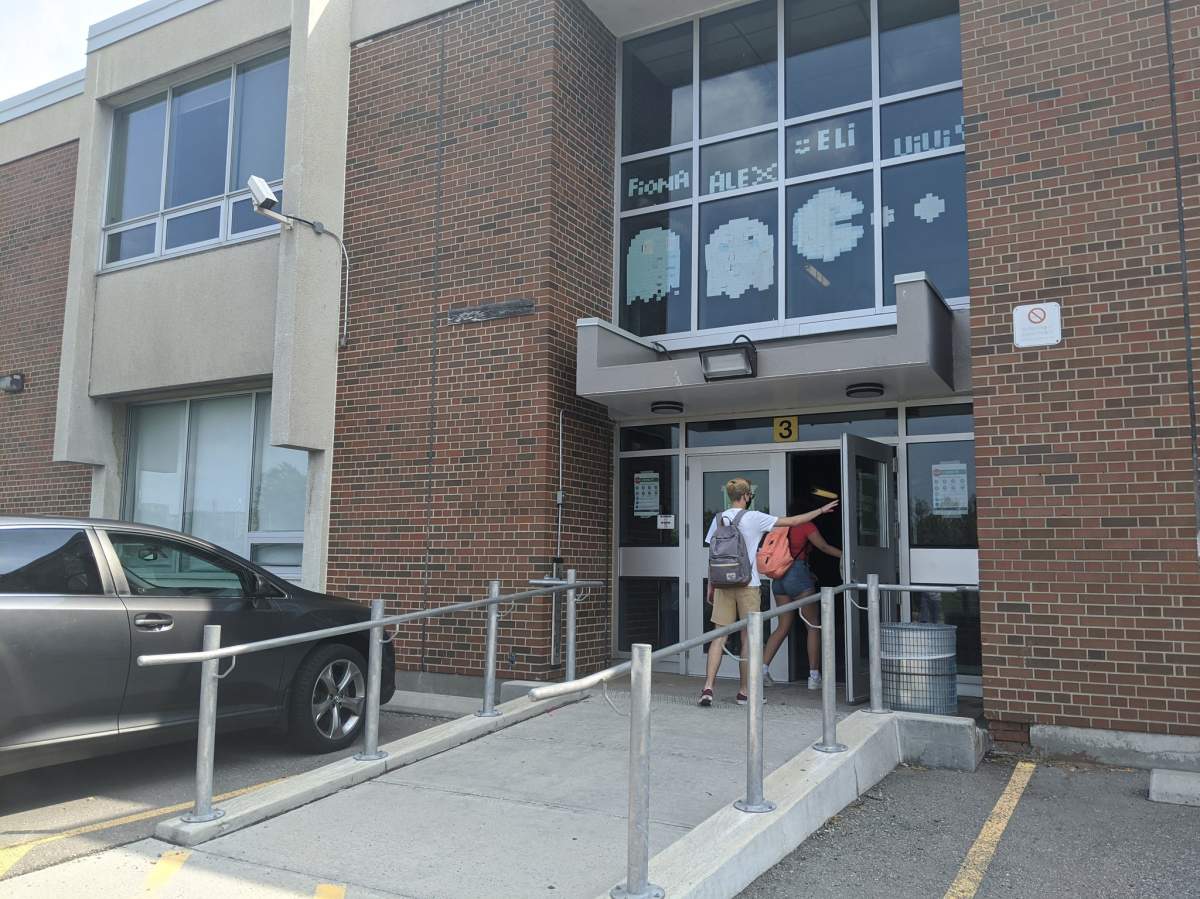 Students enter Wexford Collegiate School for the Arts from one of two designated entrances.