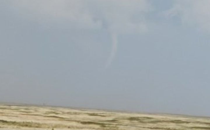Poi Yee Howard and her husband captured a photo of a funnel cloud near Youngstown, Alta., at about 6:10 p.m. on Monday.