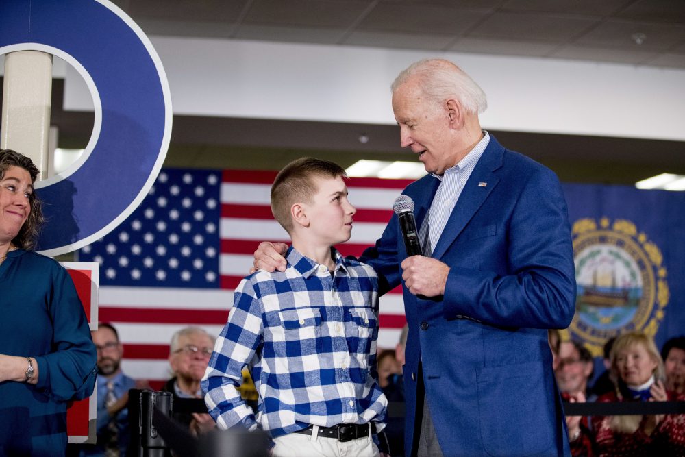 Democratic presidential candidate former Vice President Joe Biden has Brayden Harrington, then 12, come up and stand with him at a campaign stop at Cilford Community Church on Feb. 10, 2020, in Gilford, N.H.