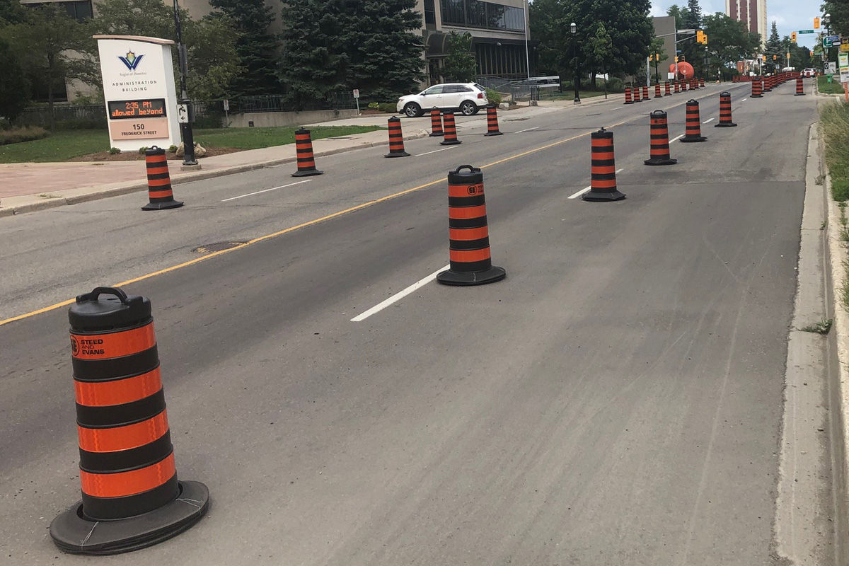 Pylons are in place to establish temporary bike lanes in front of Waterloo Regional Council offices on Frederick Street in Kitckener.
