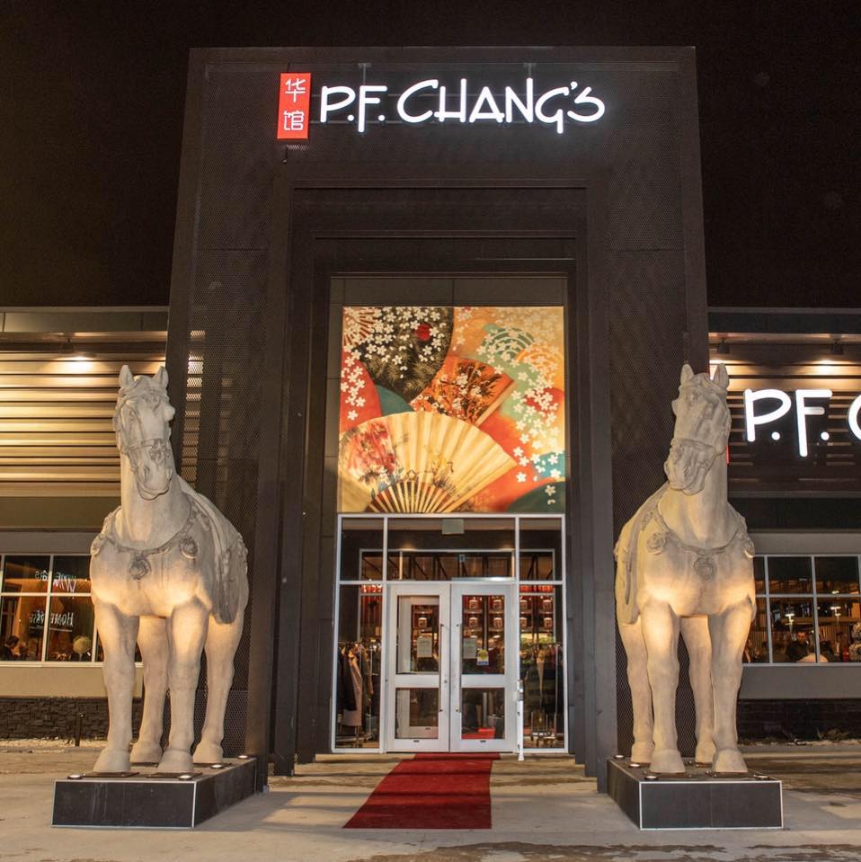 A 19-year-old man has been arrested after police say he tried to climb onto a horse statue in front of P.F Chang's restaurant on St. James Street while armed with a machete.
