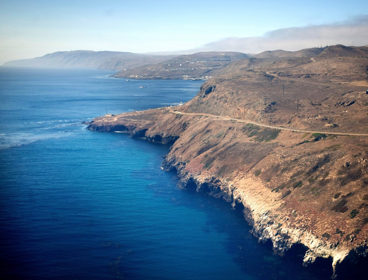 In this July 16, 2013, photo is an aerial view of the coast and Pacific Ocean taken flying in to San Clemente Island, in San Diego. A military seafaring assault vehicle that sank off the coast of Southern California with Marines and one Navy corpsman on board is under hundreds feet of water, making it impossible for divers to reach the landing craft and complicating rescue efforts for the missing troops, officials said Friday, July 31, 2020.