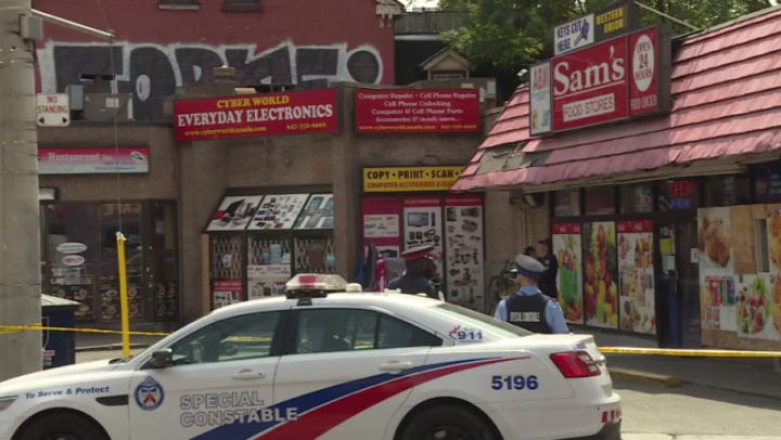 Police at the scene of a fatal stabbing in the area of Dundas and Sherbourne streets on Wednesday.