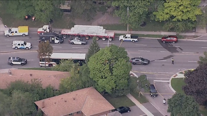 An aerial photo of emergency crews on scene at The East Mall and Burnhamthorpe Road in Etobicoke.
